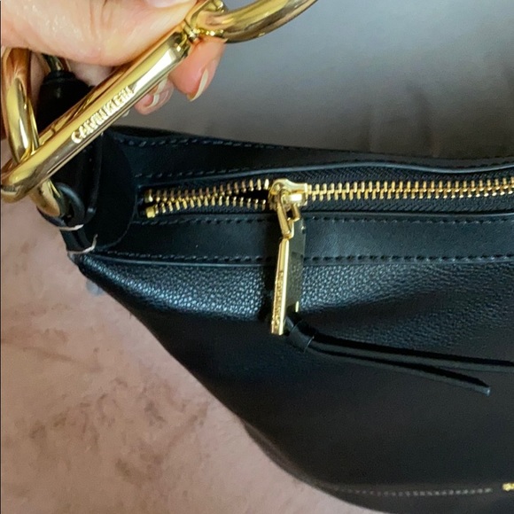 Calvin Klein
Pebble Leather Sophia Hobo Bag - Picture 12 of 13